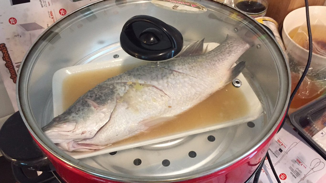 Steam the sea bass in boiling water for approximately 20 minutes